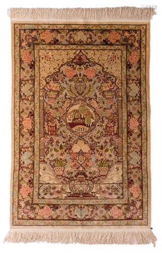 An Oriental silk and gold thread rug, decorated with floral motifs, marked, 76 x 128 cm