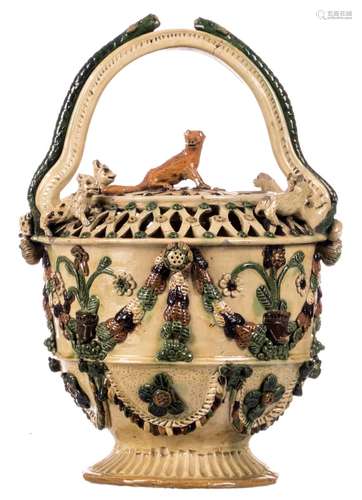 A polychrome and relief decorated typical Flemish earthenware stove, Thourout, in the Willemyns manner, 18th - 19thC, H 31 cm (damage and restoration)