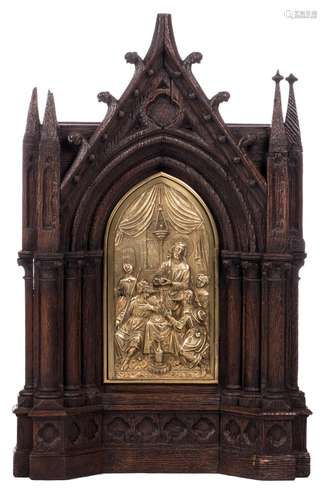 A sculpted oak Gothic revival tabernacle, the door totally bronze mounted, 19thC, H 93 cm