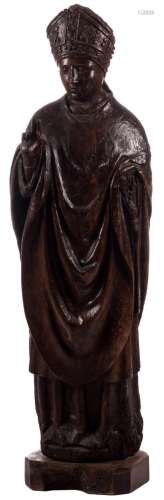 A sculpted walnut statue depicting a bishop, 16thC, H 123 (without base) - 131 cm (with base)