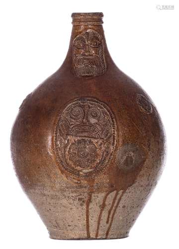 A stoneware bellarmine jug, Köln, 16thC, with one big and two smaller mascarons, H 40 cm