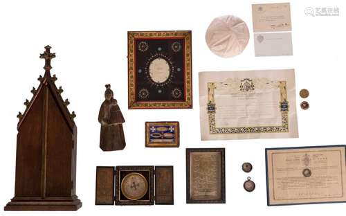 A lot of various relics, 19th and 20thC; added a relief shrine with relics of several saints, H 56 - B 38 cm