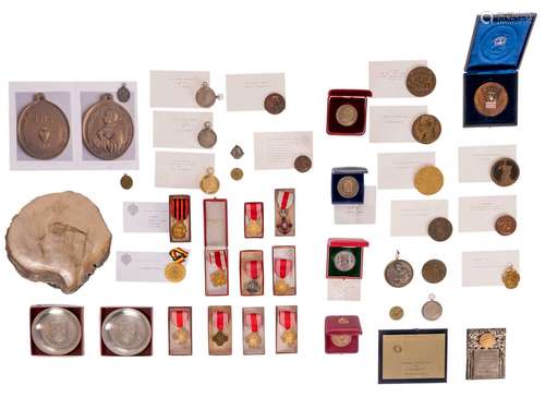 A large lot of various medals, some of silver/gilt silver, in connection with performances of students, clergymen, etc. of the Xaverian School Institute