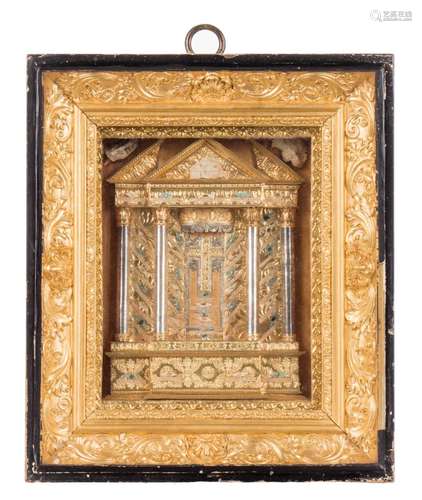 A shrine with relics of various saints, with ecclesiastical permisson, dated 1842, with a period frame, H 28,5 - W 24,5 - D 8,5 cm