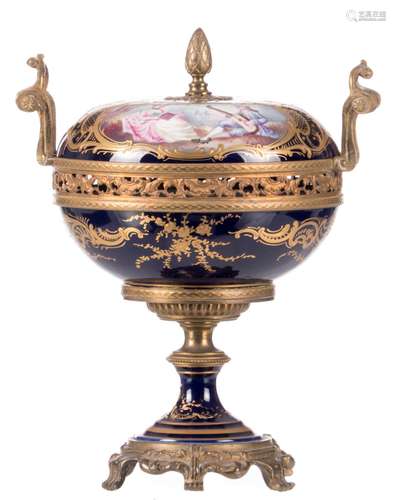 A bonbonnière in Sèvres with bronze mounts, bleu royal ground, decorated with gallant scenes and landscapes in cartouches, H 23 cm