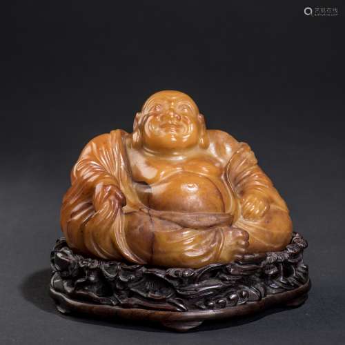 A SOAPSTONE CRAVED 'LAUGHING BUDDHA' PENDANT, QING DYNASTY