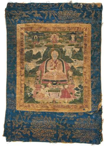 THANGKA WITH A SITTING LAMA.