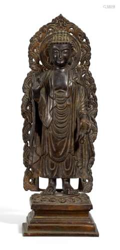 STANDING BUDDHA IN THE STYLE OF SUI PERIOD.
