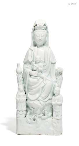 GUANYIN HOLDING A CHILD, WITH HER ENTOURAGE OF LONGNÜ AND SHANXAI.