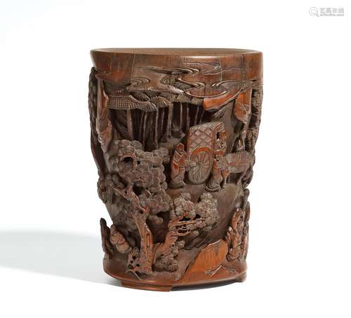 LARGE BRUSH POT WITH WOOD CUTTERS.