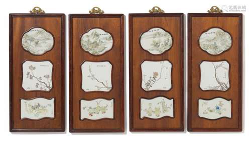 FOUR PANELS EACH WITH THREE PORCELAIN PLATES.