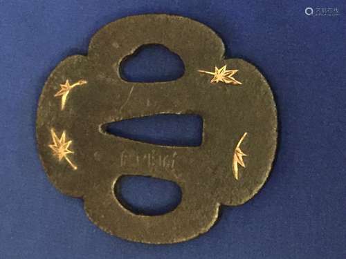 Antique Japanese samurai sword tsuba.