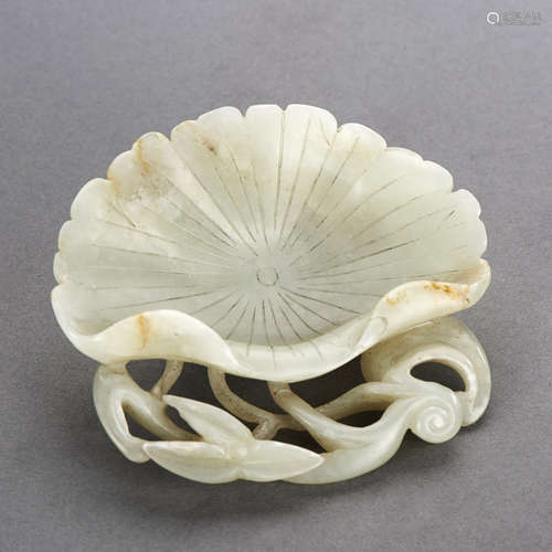 A CHINESE WHITE JADE LOTUS LEAF FORM BRUSH WASHER