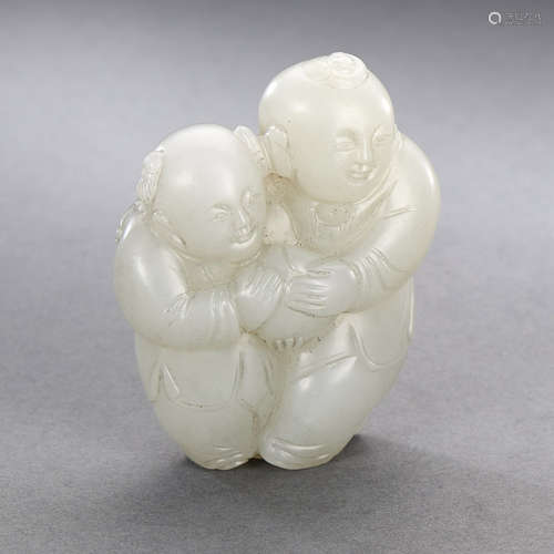 A CHINESE WHITE JADE CARVING OF BOY GROUP