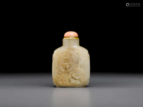 Late 19th/20th century A white and russet hardstone snuff bottle carved with archaic coins