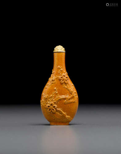 Jingdezhen kilns, School of Wang Bingrong, 1862-1910 A carved and caramel glazed porcelain snuff bottle