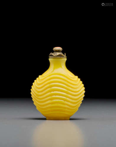Imperial, Palace Workshops, Beijing, 1750-1840 A rare yellow glass snuff bottle with a waving rib design