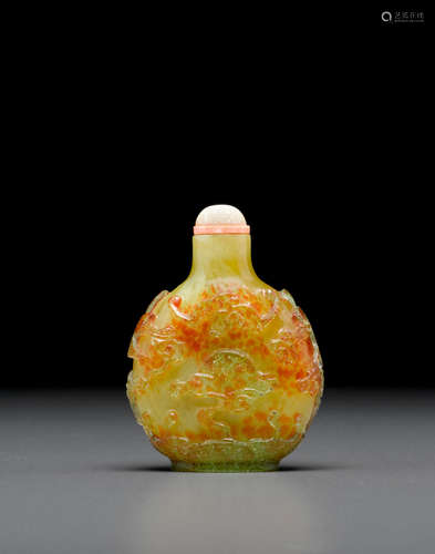 Probably Imperial, attributed to the Palace Workshops, Beijing, 1750-1850 A pale green overlay decorated motteled glass snuff bottle