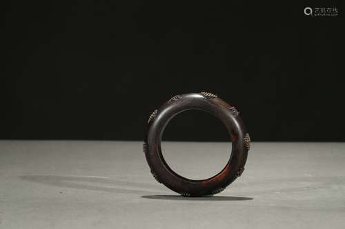 An agarwood 'gold bead' bangle