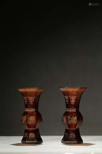 A pair of glass gilt-painted vases