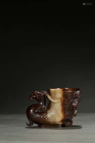 A jade carved 'chilong and phoenix' cup