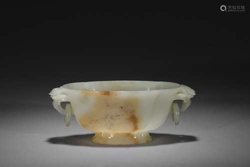 A white and russet jade vessel