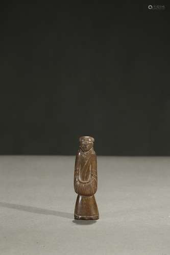 A jade carving of standing figure