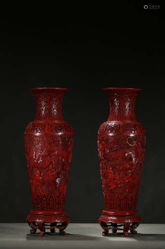 Pair of large cinnabar lacquer 'figures and landscape' vases