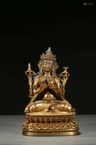 A gilt bronze figure of Maitreya