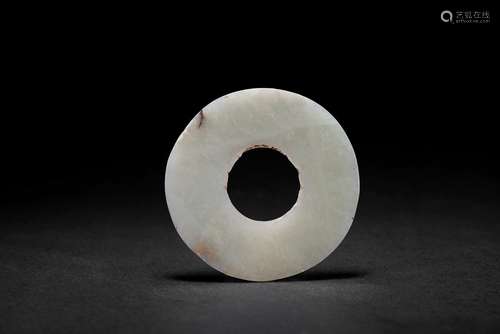 A white jade carved disc