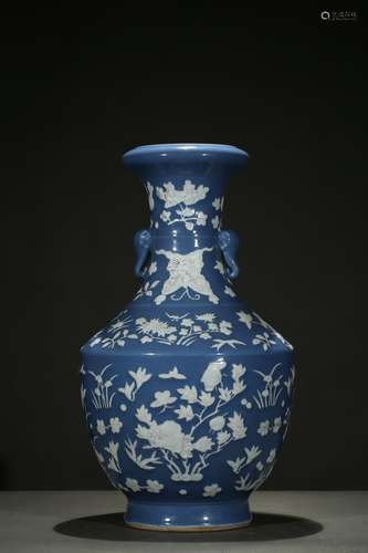 A blue and white reserve-decorated 'flower' vase