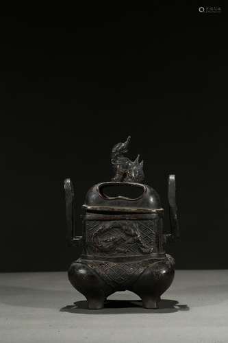 A bronze four-feet censer and cover