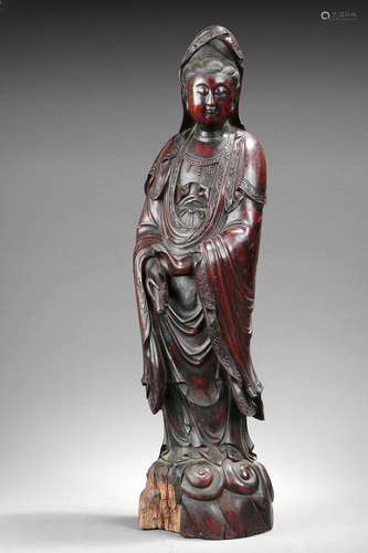 A rosewood carved figure of Guanyin