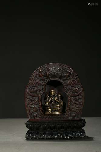 An agarwood carved shrine w/ copper alloy tara