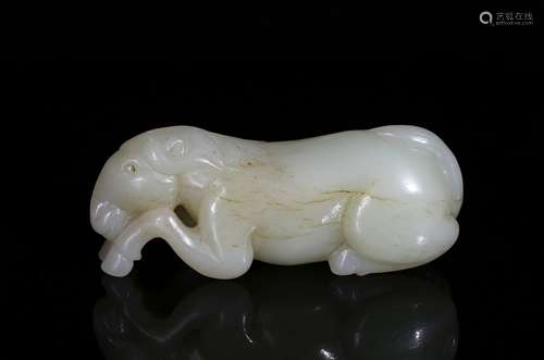 A white jade carved recumbent horse