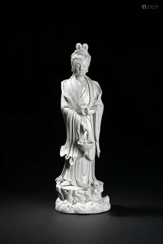 A dehua white glaze standing 'guanyin' figure