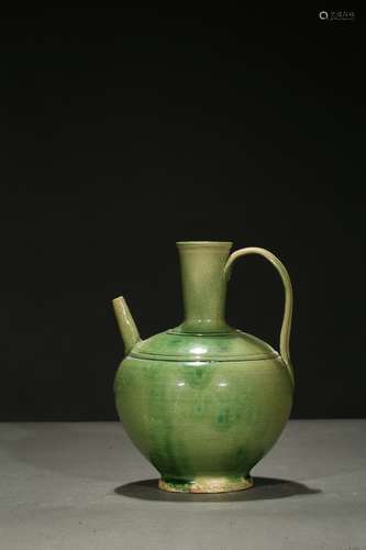 A green glazed pottery ewer