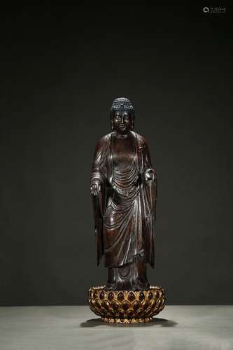 A large agarwood carving of standing bodhisattva