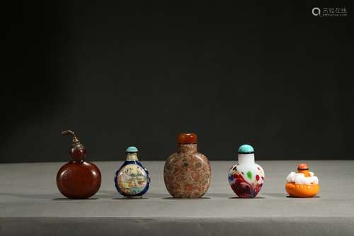 A group of five various snuff bottles