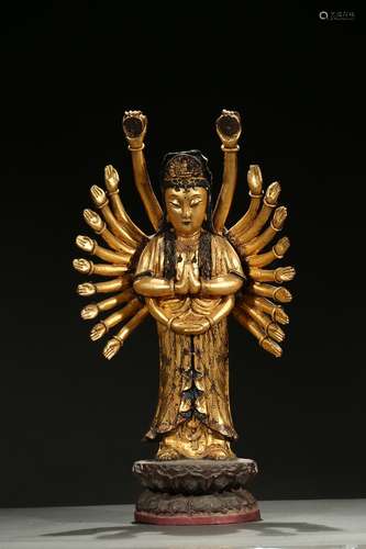 A gilt-lacquered wood multi-arm Guanyin