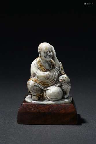 A soapstone gilt-painted luohan