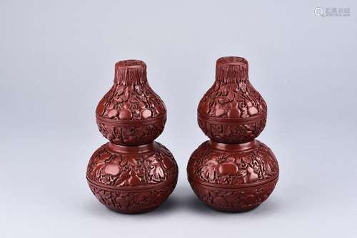 A pair of double gourd cinnabar lacquer boxes