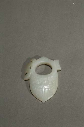 A small white jade carved ornament