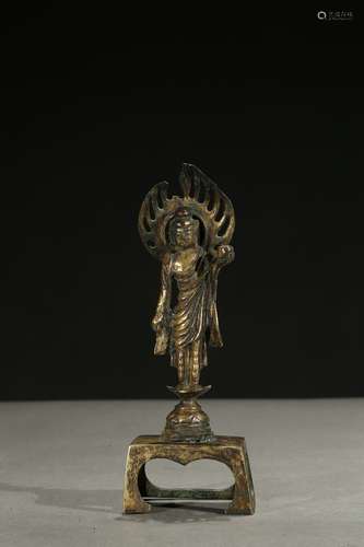 A gilt-bronze figure of standing bodhisattva