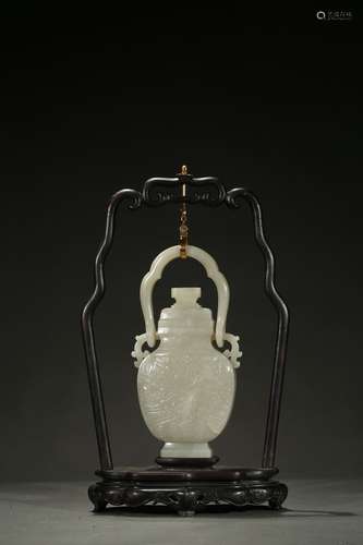 A white jade archaistic hanging vessel