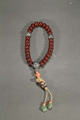 A puti bead and Dzi bead rosary bracelet