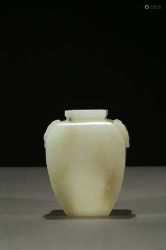 A small white jade carved jar