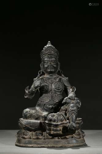 A bronze figure of Tibetan jambhala