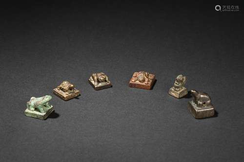 A group of six animal-finial bronze seals