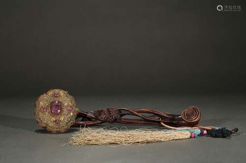 A rosewood gilt silver wire gems inlaid ruyi scepter